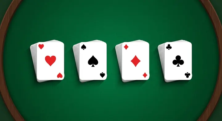 Four foundation piles, one per suit, each built up in order from Ace to King in Spider Solitaire