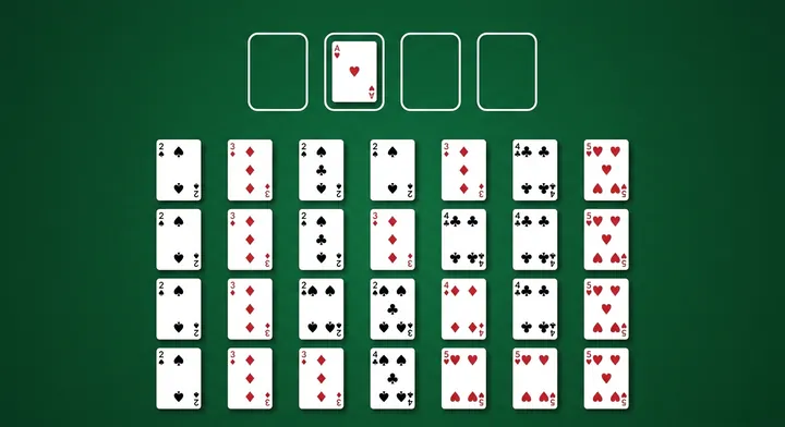 Four empty free cell slots with a single card parked in one of them in FreeCell Solitaire